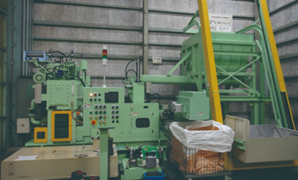 Photo: Grinding and polishing sludge compression device